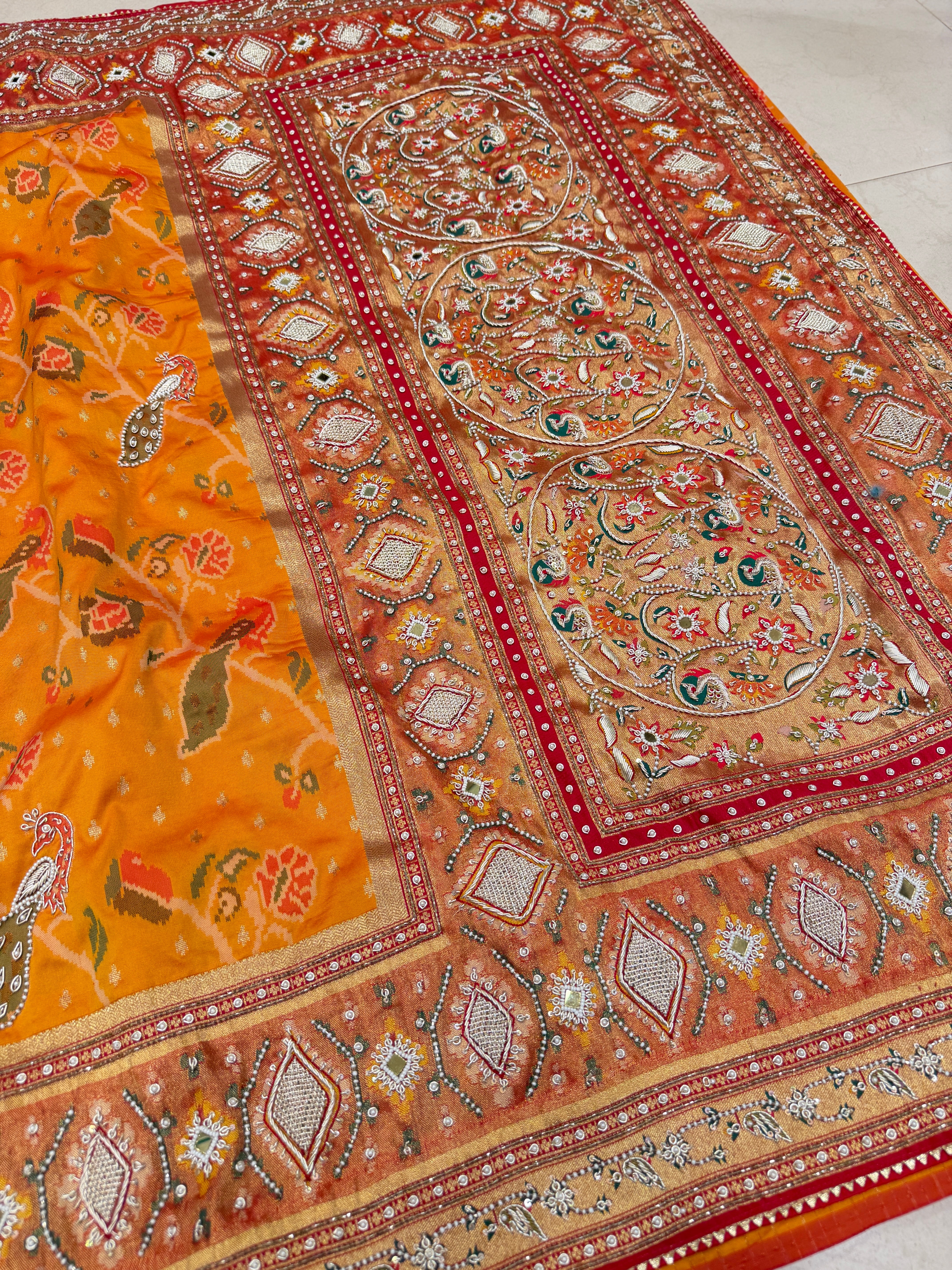 Rust Orange Patola Peacock Motif Zardosi Hand Embroidery Saree