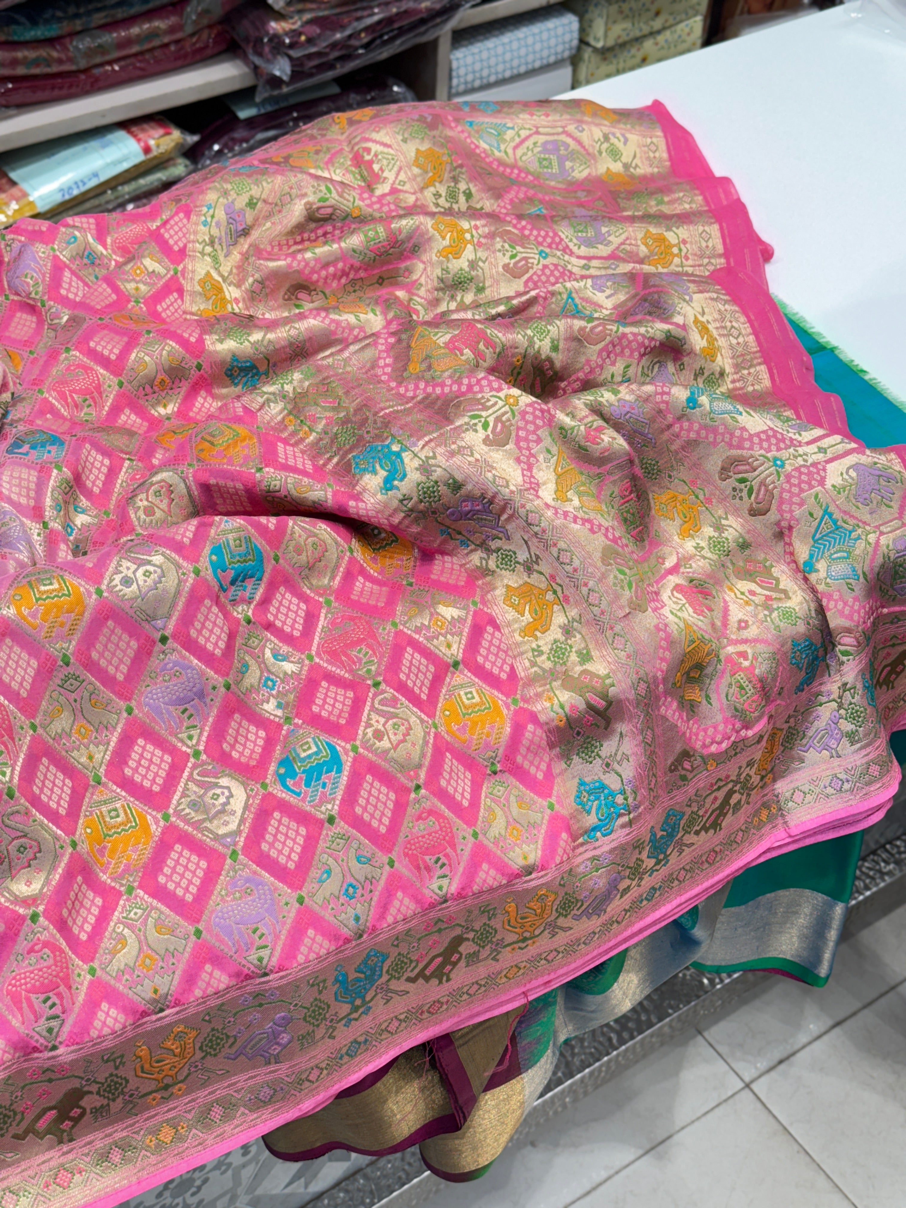 Shaded Pink Georgette Woven Bandhej Patola Saree