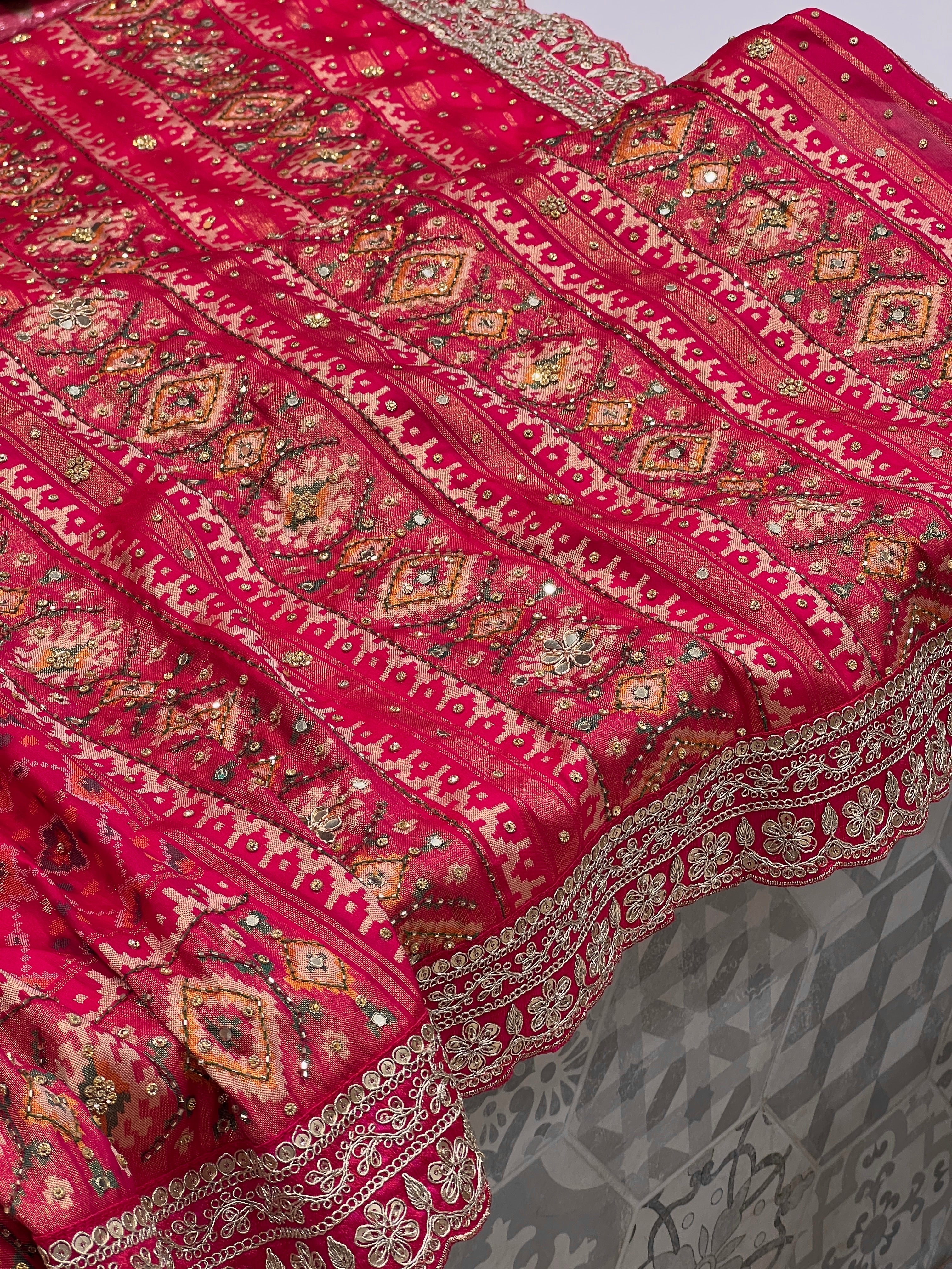 Pinkish Red Patola Hand Embroidery Saree