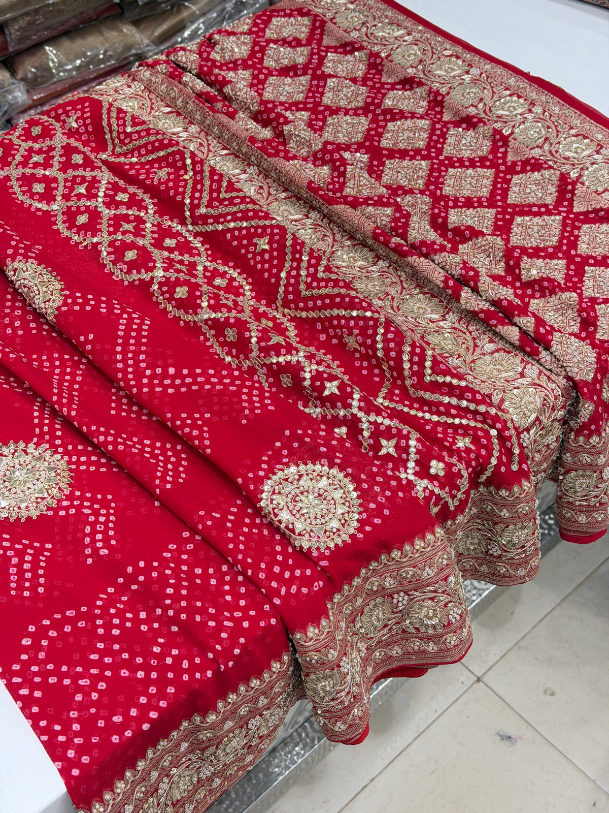 Red Rai Bandhej Georgette Saree Marodi Zardosi Hand Embroidery Saree