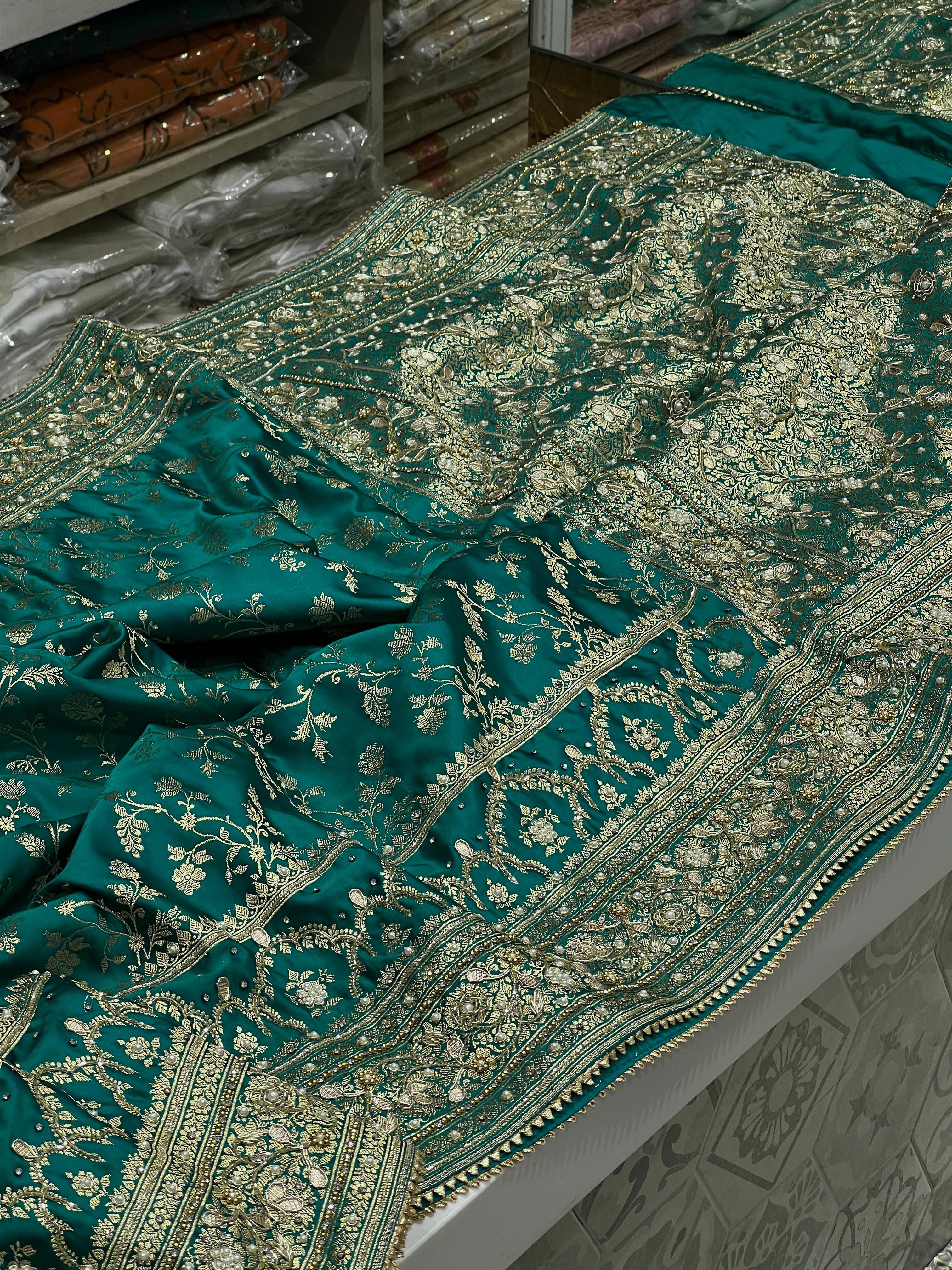 Warm Teal Green Banarasi Silk Hand Embroidery Saree