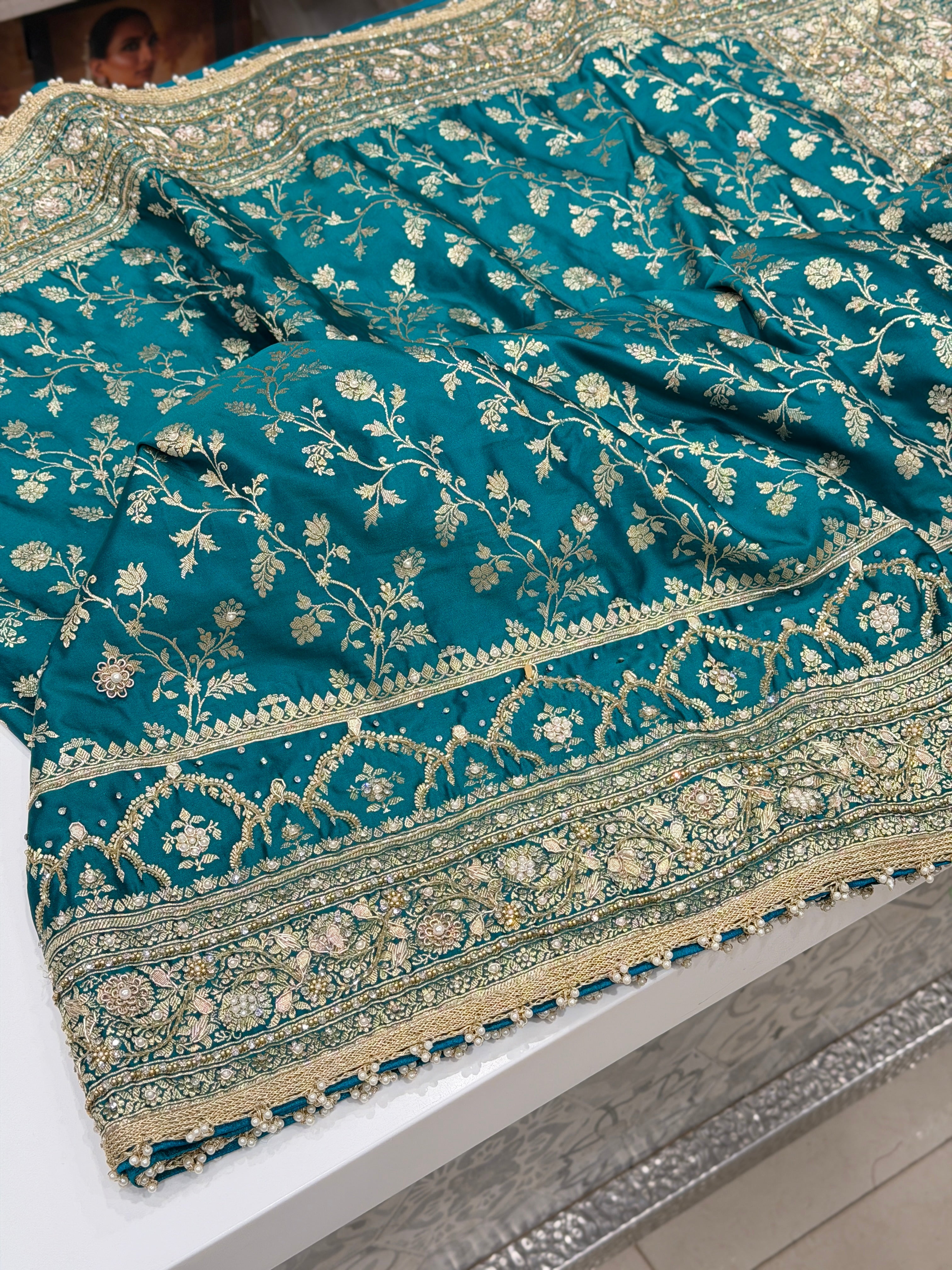 Warm Teal Green Banarasi Silk Crown Border Silk Embroidery Saree