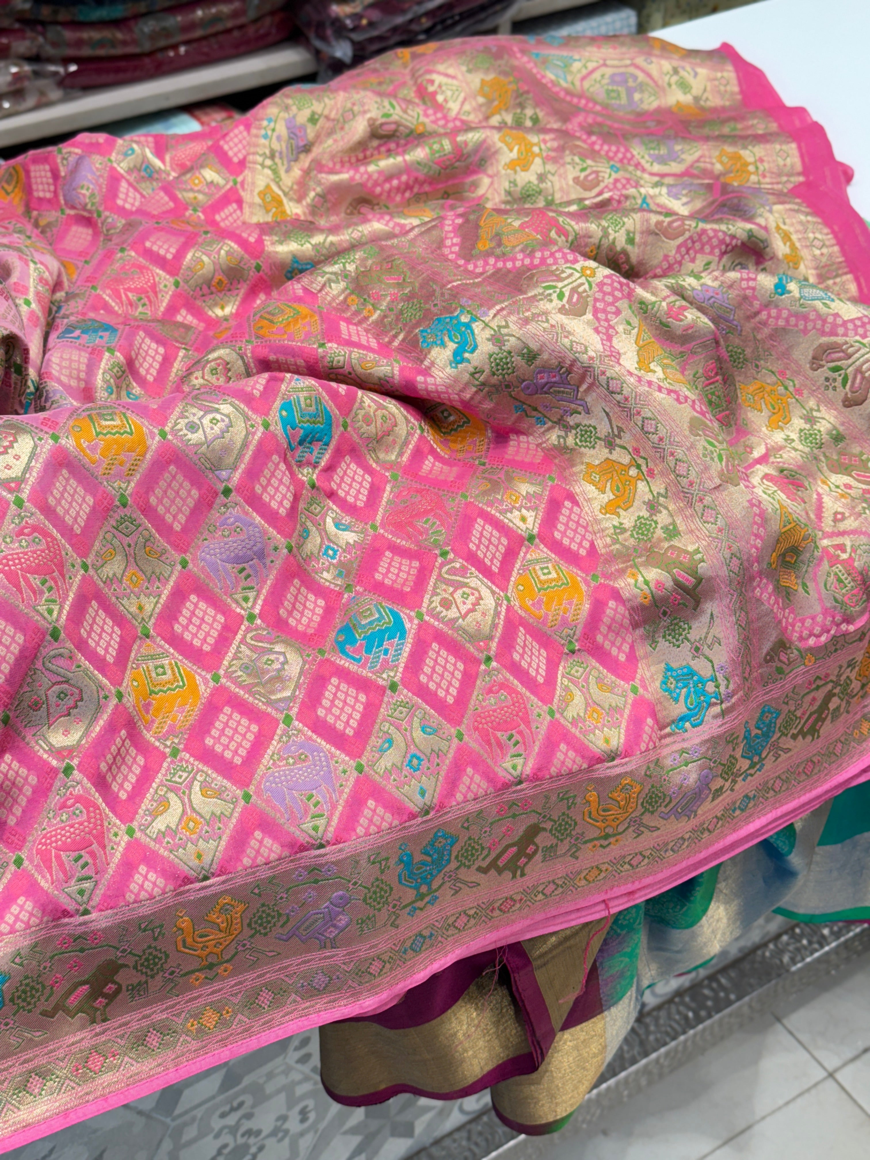 Shaded Pink Georgette Woven Bandhej Patola Saree