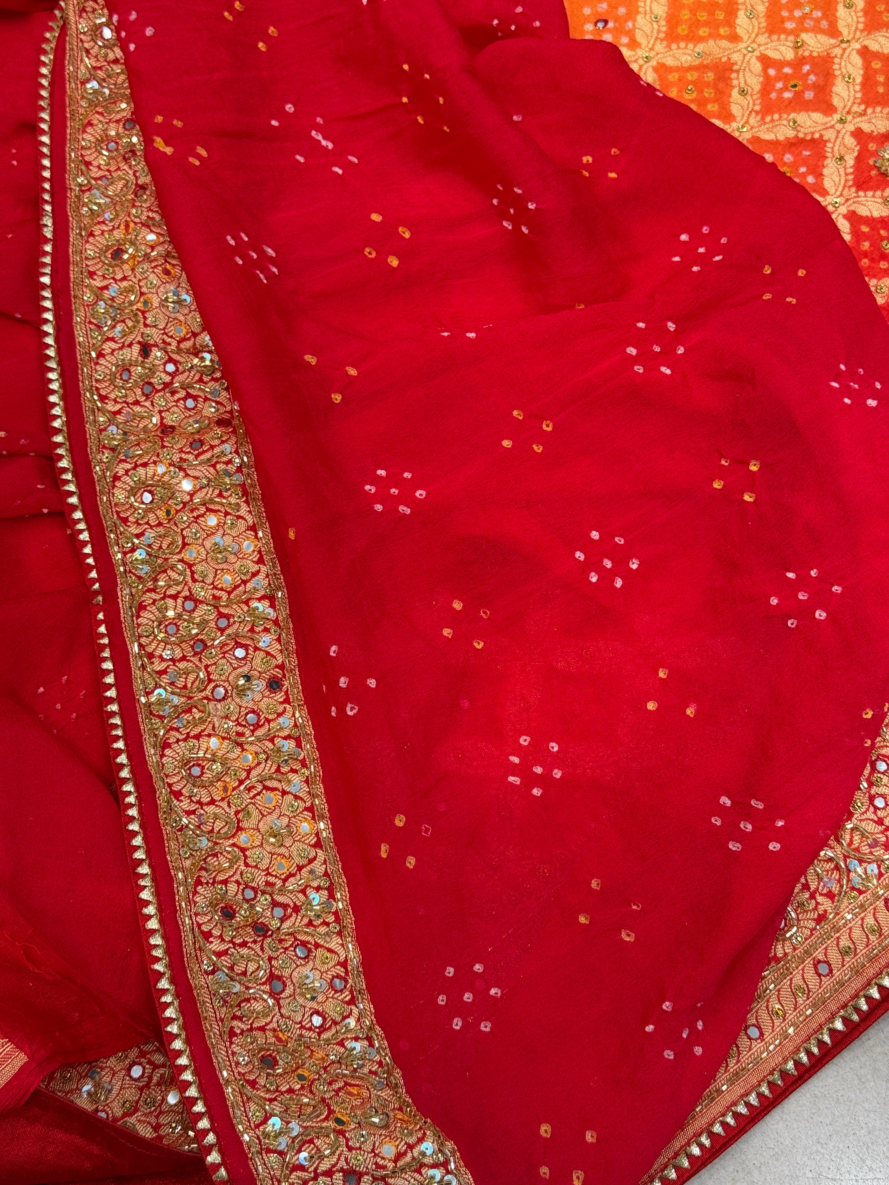 Orange Red Shaded Bandhej Hand Embroidery Saree