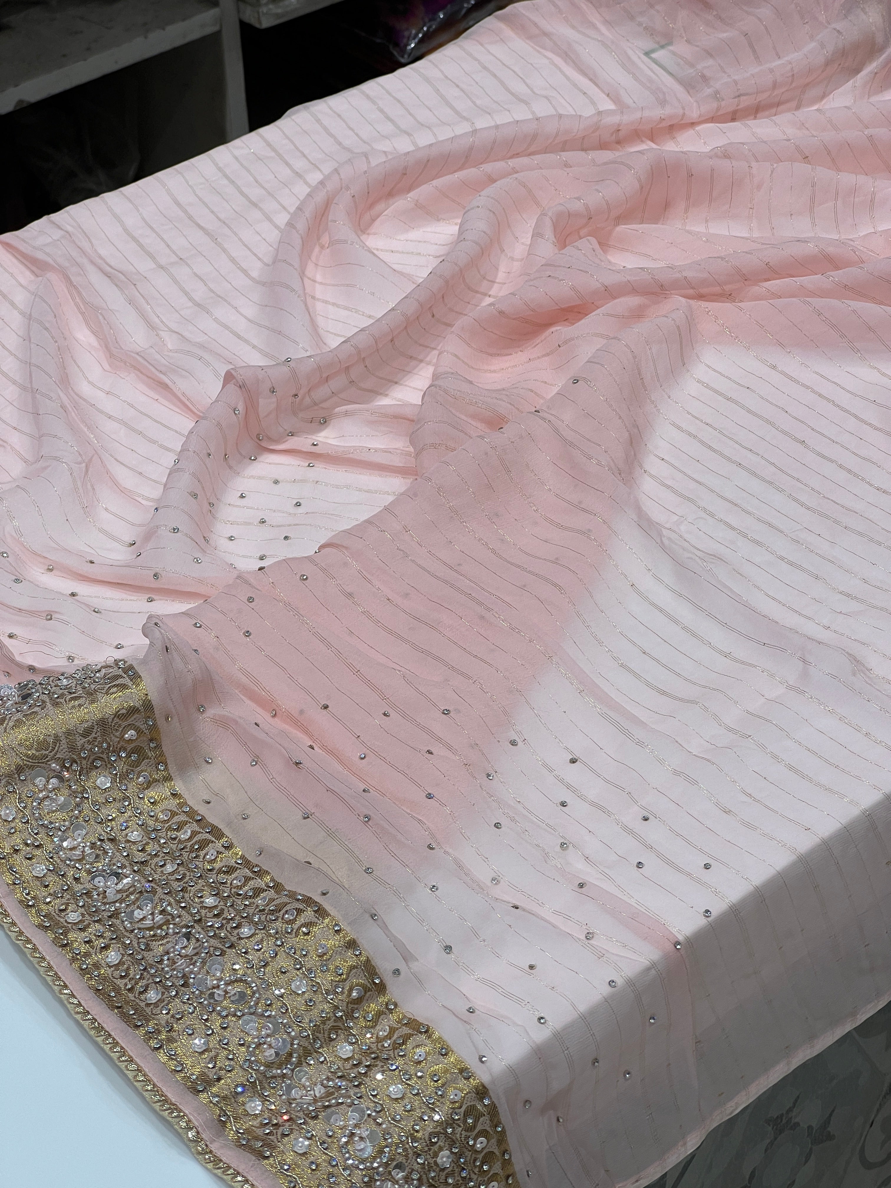 Baby Pink Khaddi Georgette Hand Embroidery Saree