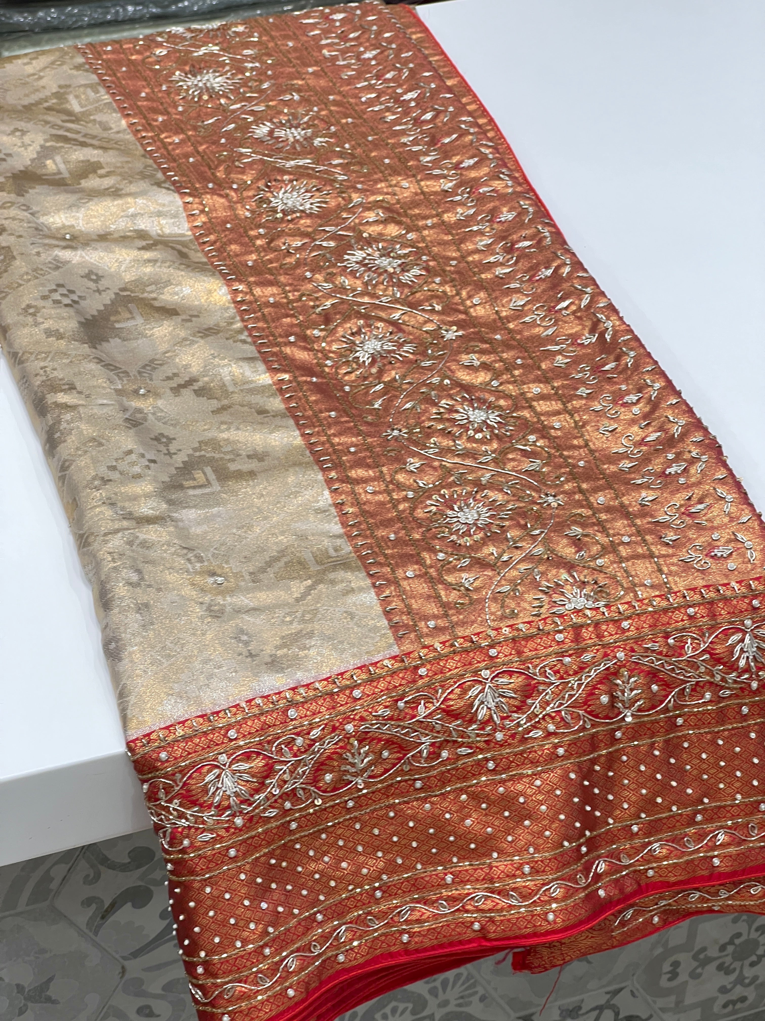 Beige Red Tissue Kanjivaram Hand Embroidery Saree