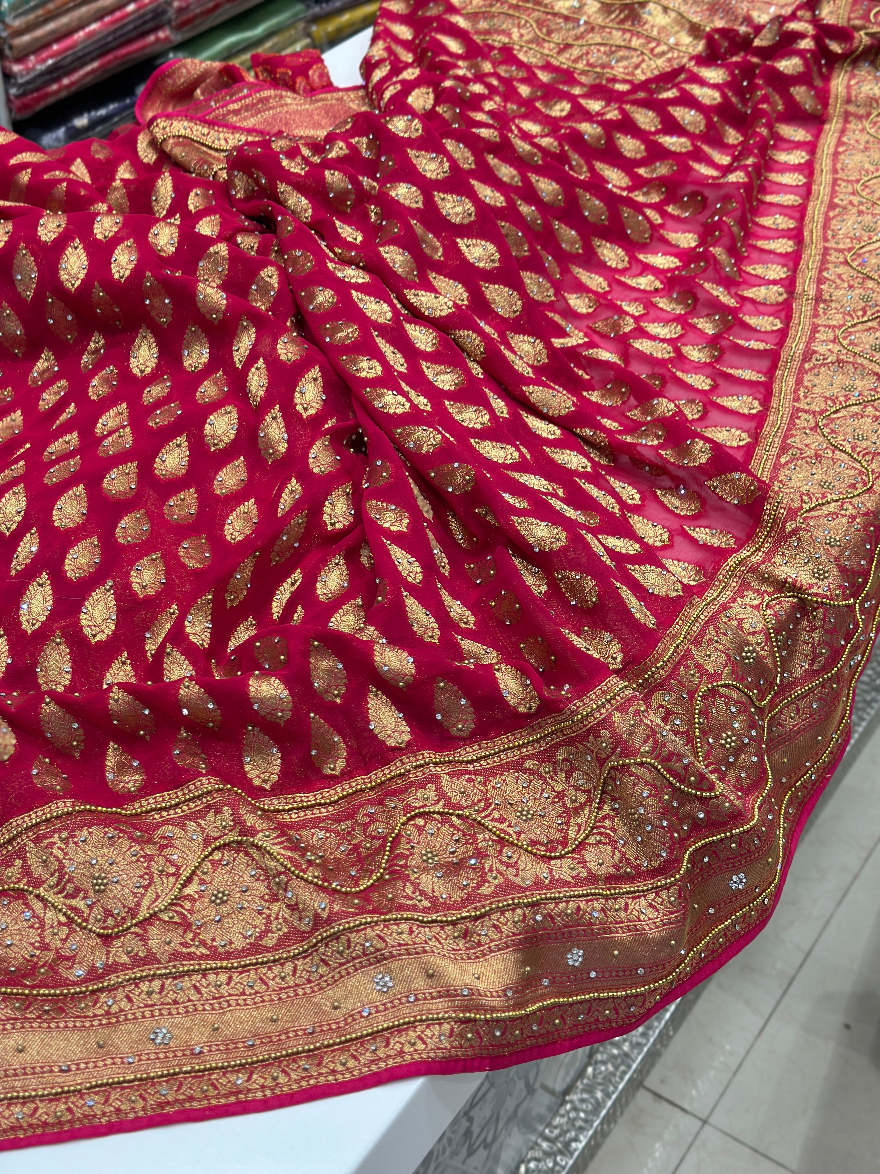 Rani Tilak Buttis Georgette Hand Embroidery Saree